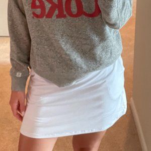 Large white tennis skirt with shorts underneath